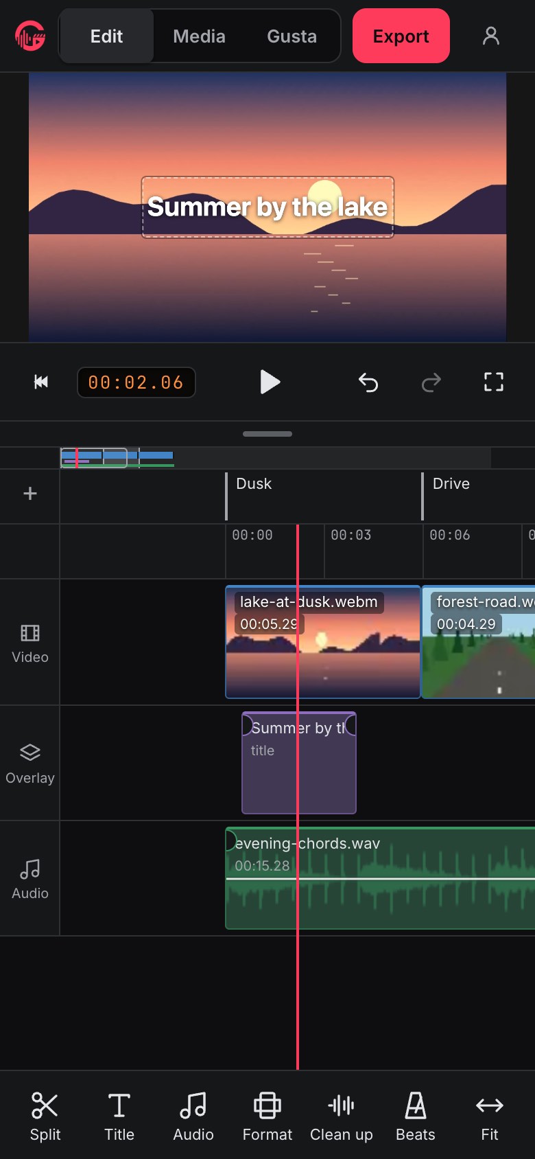 Gusta Video on a phone: the lake at dusk with its title in the preview, and below it the timeline scrolling under a fixed playhead line in the middle, with the video, overlay and audio tracks and Split, Title, Audio, Format, Clean up, Beats and Fit along the bottom